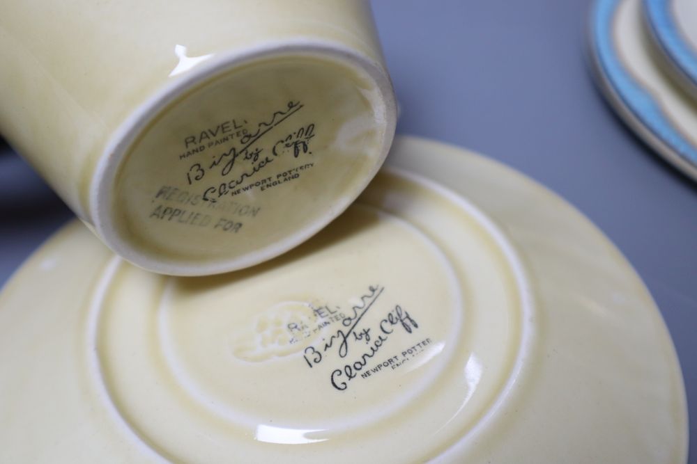 A Clarice Cliff Ravel pattern tea cup and saucer and a Queen Elizabeth II coronation trio, 1953